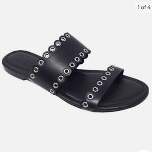 Paige Devyn black scalloped grommet slides, size 10